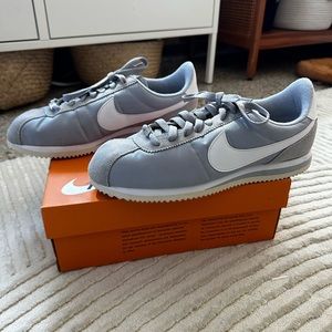Gray and white nylon Nike Cortez